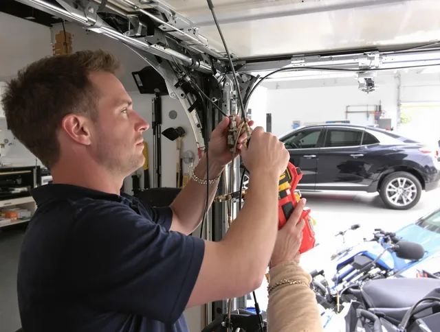 North Tustin Garage Door Repair safety certified technician performing cable replacement in North Tustin