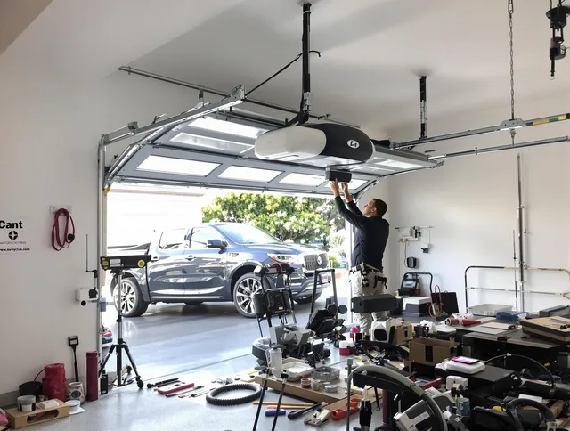 North Tustin Garage Door Repair specialist installing smart garage door opener system in North Tustin home