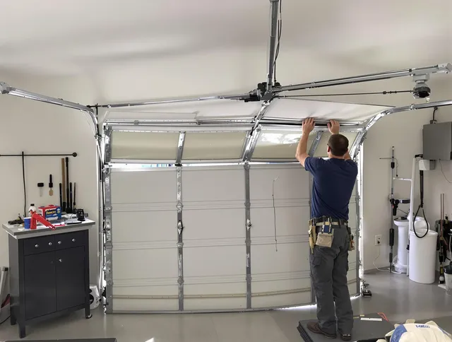 North Tustin Garage Door Repair specialist performing precise section replacement on North Tustin garage door