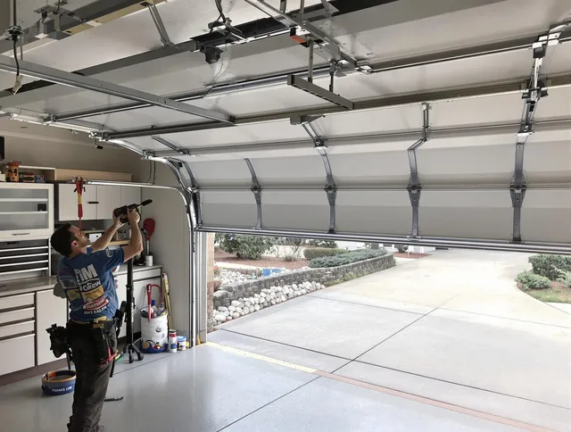 Garage door track repair service by North Tustin Garage Door Repair in North Tustin